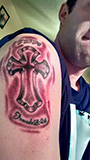Troy Galloway arm tattoo